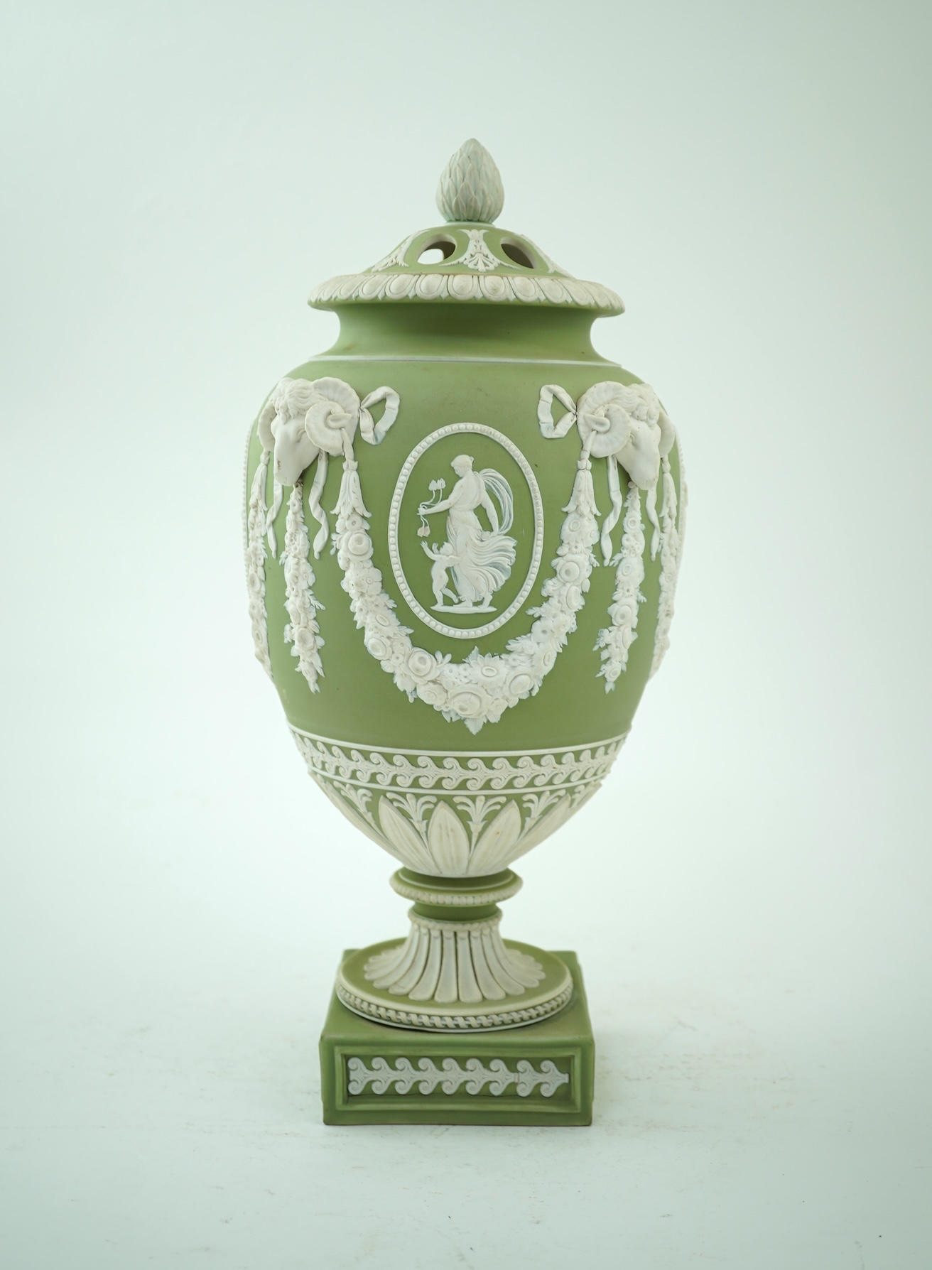 A Wedgwood green jasperware covered pot pourri urn, early 19th century